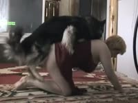 Horny blonde opening wide her pussy for dog's pleasuring